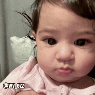 A Close Up Of A Baby 'S Face With The Name @Wv_czz On The Bottom Right GIF