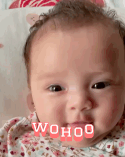 A Close Up Of A Baby 'S Face With The Words ' Wohoo ' Written On It . GIF