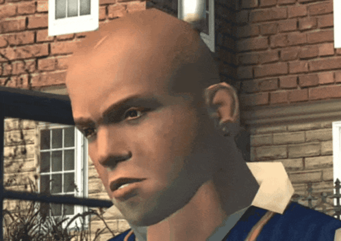 A Close Up Of A Bald Man 'S Face With A Brick Wall In The Background GIF