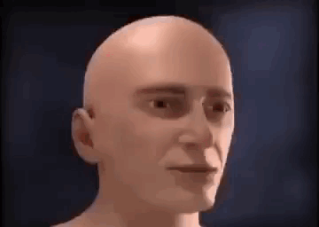 A Close Up Of A Bald Man 'S Face With A Smile On It . GIF