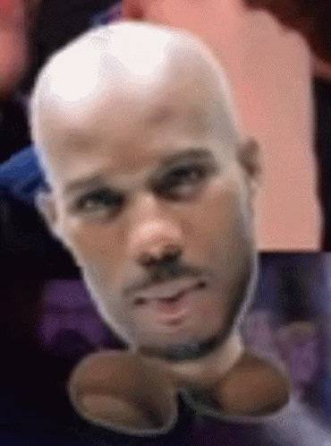 A Close Up Of A Bald Man 'S Head With A Beard GIF