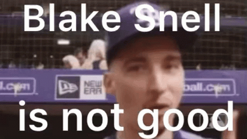 A Close Up Of A Baseball Player Wearing A Blue Hat With The Words Blake Snell Is Not Good Behind Him . GIF