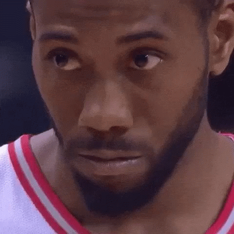 A Close Up Of A Basketball Player 'S Face With A Beard And A Smile . GIF