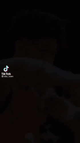 a close up of a basketball player 's face with a tiktok watermark at the bottom