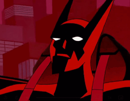 A Close Up Of A Batman Cartoon Character With A Red Background And Buildings In The Background . GIF