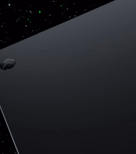 A Close Up Of A Black Box With A Green Circle In The Background GIF