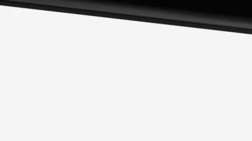 A Close Up Of A Black Object On A White Background GIF