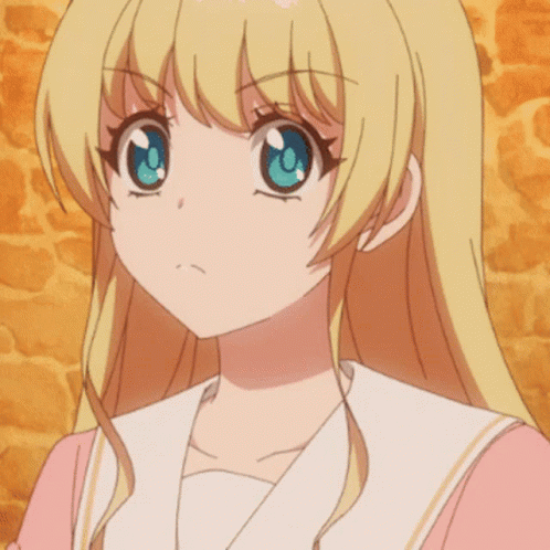 A Close Up Of A Blonde Anime Girl 'S Face With A Brick Wall In The Background GIF