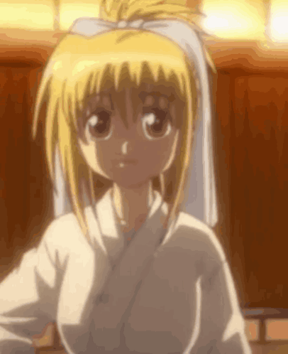 A Close Up Of A Blonde Anime Girl Wearing A White Robe And A White Towel On Her Head . GIF