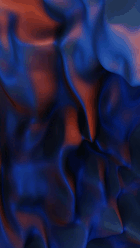 A Close Up Of A Blue And Orange Colored Cloth GIF