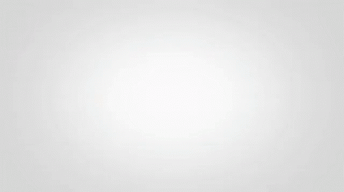 A Close Up Of A Blue Liquid Splashing On A White Surface GIF