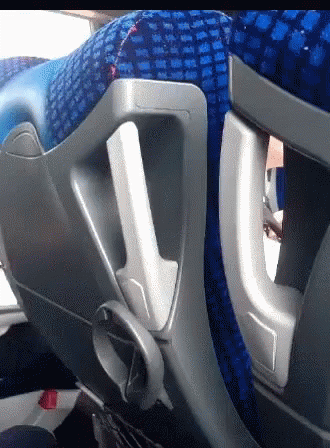 A Close Up Of A Blue Seat With A Handle GIF