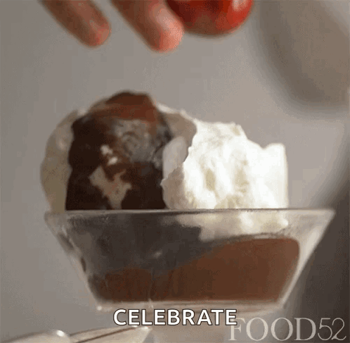 A Close Up Of A Bowl Of Ice Cream With The Words Celebrate Food52 On The Bottom GIF