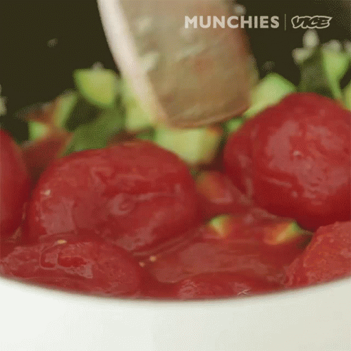 A Close Up Of A Bowl Of Tomatoes With The Words Munchies Vice Written On The Bottom GIF