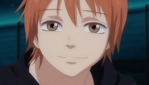 Close Up Of Boy's Face With Red Hair And Brown Eyes GIF