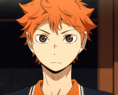 A Close Up Of A Boy With Orange Hair And Brown Eyes GIF