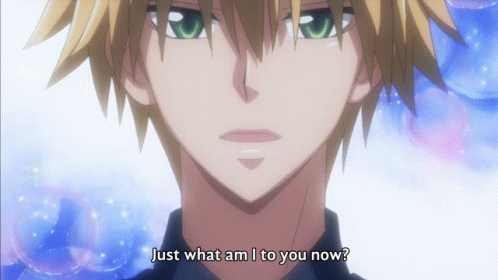 A Close Up Of A Boy With The Words Just What Am I To You Now GIF