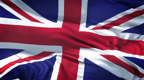 A Close Up Of A British Flag With Red White And Blue GIF