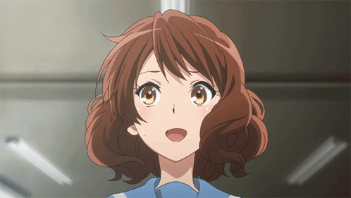 a close up of a brown haired anime girl