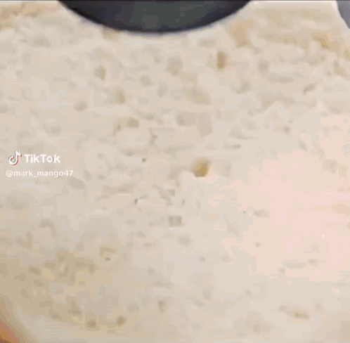 A Close Up Of A Cake With Ketchup And Mustard On Top GIF