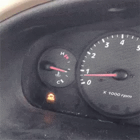 A Close Up Of A Car Dashboard With A Tachometer That Says X 1000 GIF