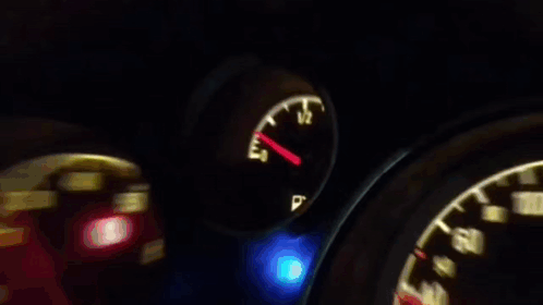 A Close Up Of A Car Dashboard With The Speedometer Displaying 220 GIF