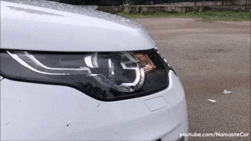 A Close Up Of A Car 'S Headlight With Youtube.com/namastecar Written On The Bottom GIF