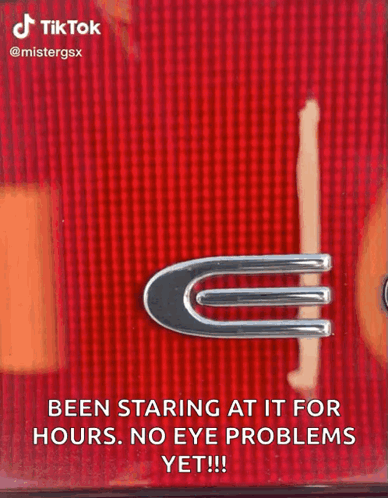 Close Up Of Car Tail Light With Staring At It Text GIF