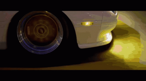 A Close Up Of A Car 'S Wheel With A Sticker On It That Says ' Bbs ' GIF