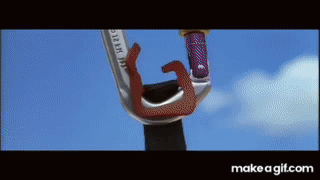 A Close Up Of A Carabiner With A Blue Sky In The Background .. GIF