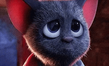 A Close Up Of A Cartoon Cat With Big Blue Eyes And Red Ears . GIF