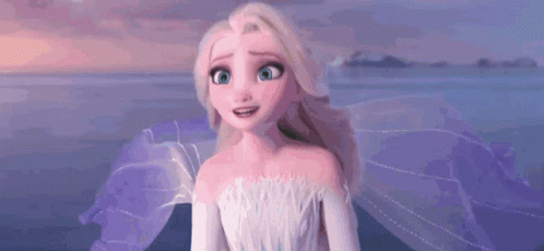 A Close Up Of A Cartoon Character From The Movie Frozen Ii Standing In Front Of A Body Of Water . GIF