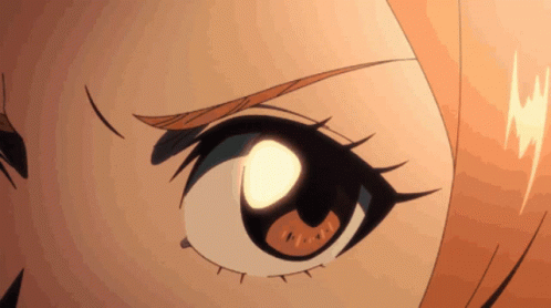 a close up of a cartoon character 's eye with a light shining through it