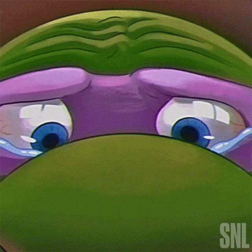 A Close Up Of A Cartoon Character 'S Eyes With The Snl Logo In The Background GIF