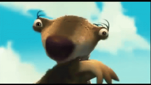 A Close Up Of A Cartoon Character 'S Face Against A Blue Sky GIF