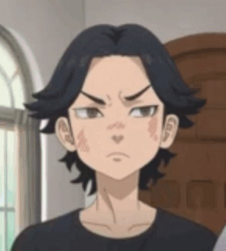 A Close Up Of A Cartoon Character 'S Face With A Black Shirt On . GIF