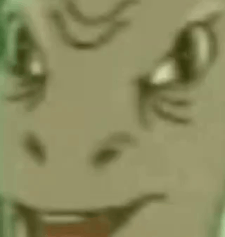 a close up of a cartoon character 's face with a red tongue .
