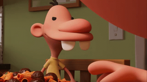 A Close Up Of A Cartoon Character 'S Face With A White Tooth GIF