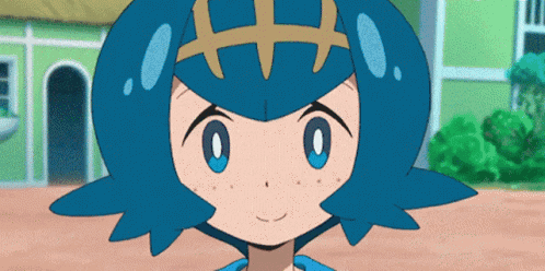 A Close Up Of A Cartoon Character 'S Face With Blue Hair And Blue Eyes GIF