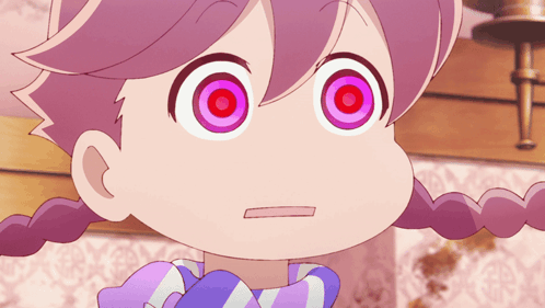 A Close Up Of A Cartoon Character 'S Face With Purple Eyes GIF