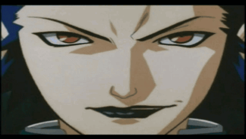 A Close Up Of A Cartoon Character 'S Face With Red Eyes GIF