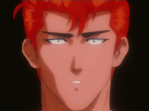 A Close Up Of A Cartoon Character 'S Face With Red Hair And White Eyes GIF
