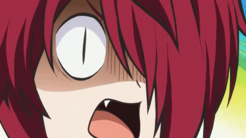 A Close Up Of A Cartoon Character 'S Face With Red Hair And White Eyes GIF