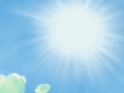 A Close Up Of A Cartoon Character 'S Head With The Sun Shining Through It GIF