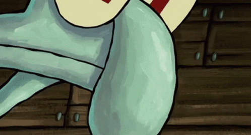 A Close Up Of A Cartoon Character 'S Legs With A Wooden Wall In The Background GIF