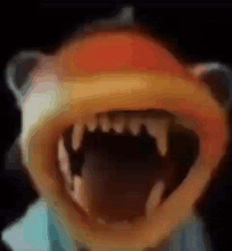 A Close Up Of A Cartoon Character 'S Mouth With Teeth GIF