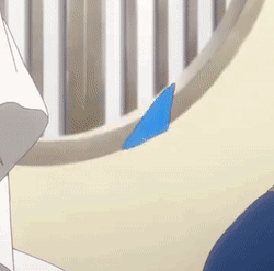 a close up of a cartoon character 's tail with a blue triangle on it .