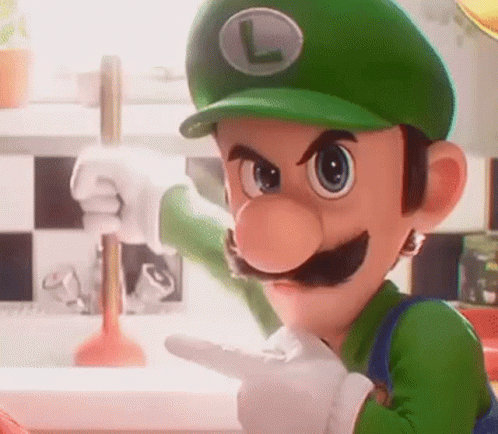 A Close Up Of A Cartoon Character Wearing A Green Hat And Gloves Pointing At Something . GIF