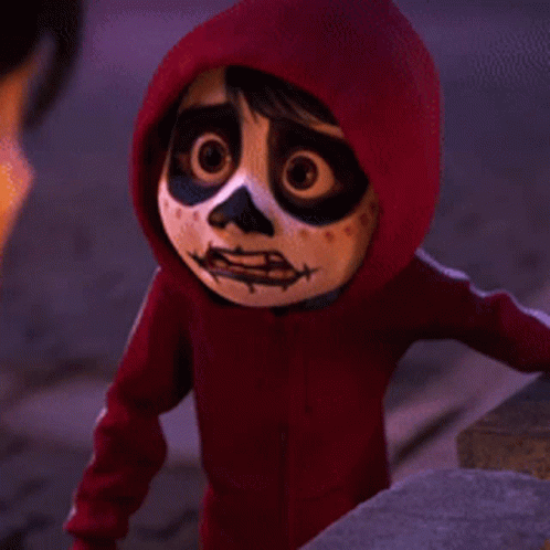A Close Up Of A Cartoon Character Wearing A Red Hoodie With A Skeleton Face Painted On It . GIF