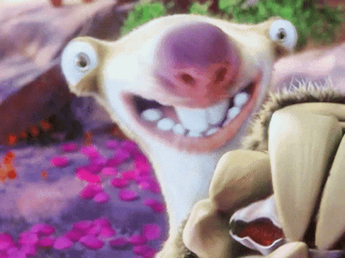 A Close Up Of A Cartoon Character With A Big Smile GIF